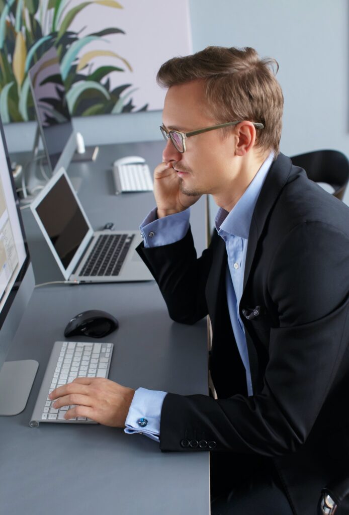 Young business man in office.